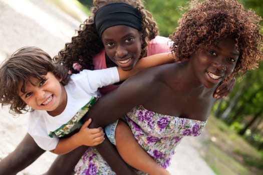 Happy african children having a nice dat at the park.