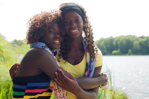 Happy african children having a nice dat at the park.