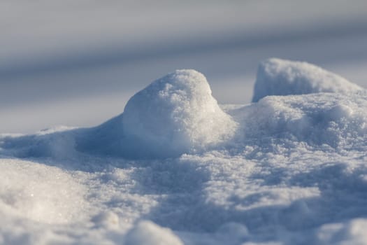 Cool picture of fine snow covering ice at the height of winter. With copy space.