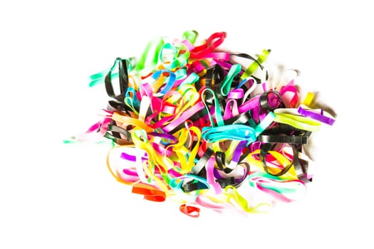 Hair clips and elastic rings isolated on white background.