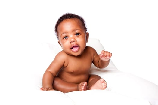 Cute happy smiling adorable baby infant sitting, on white.