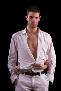 View of sexy scene where female hands undress a handsome man.