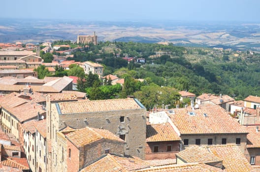 Picturesque view on historic buildings of Volterra in Tuscany, Italy