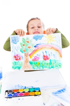 Happy boy showing his painting
