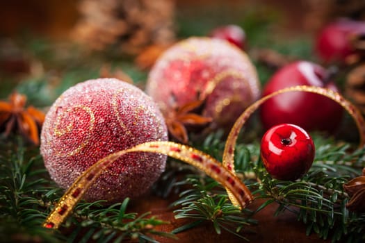 Traditional Christmas decoration with apples and balls