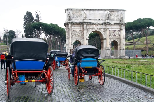 View of the arch of Constantine near the Coliseum in Rome, Italy.
