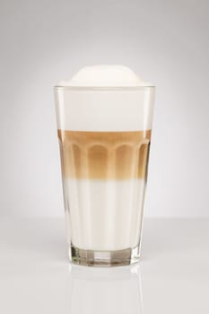 Latte macchiato on grey background