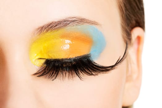 Beautiful woman with abstract artistic make up.