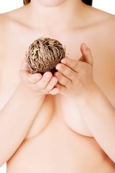 Beautiful spa woman holding Rose of Jericho