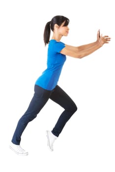 Woman pushing something imaginary isolated over a white background