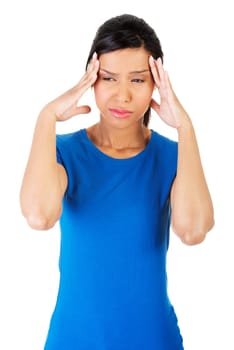 Woman with headache or problem holding her hand to the head