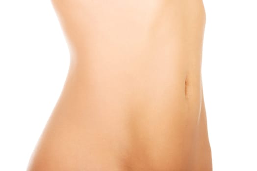 Close up of perfect nude body of young fit woman, isolated on white