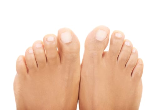 Beautiful female feet - close up on toes , isolated on white.