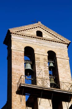 Bell tower detail  in the exterior of the Basilica of St. Mary of the Altar of Heaven located in Rome, Italy.