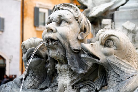 Statues detail from fountain near the Pantheon in piazza Rotonda, Rome, Italy.