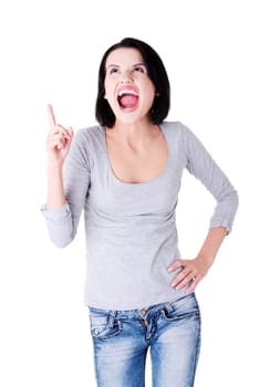 Surprised woman screaming and pointing at copy space. Isolated on white background.