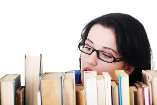 Happy smiling young student woman with books, isolated on white background