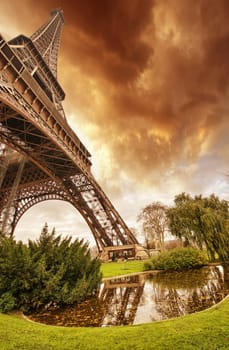 Beautiful sunset colors of Eiffel Tower with its magnificence - Paris.