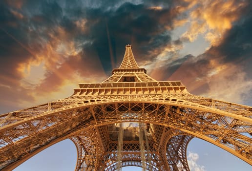 Beautiful view of Eiffel Tower in Paris with sunset colors.