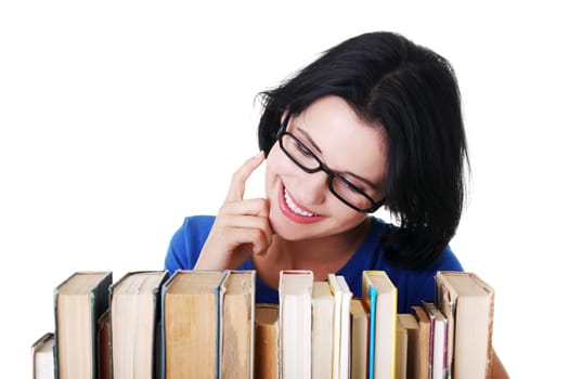 Happy smiling young student woman with books, isolated on white background