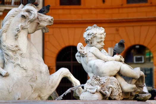 Close view details of the fountain of the four Rivers with Egyptian obelisk, located in the Piazza Navona, Rome, Italy.