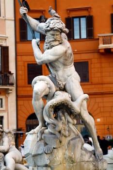 Close view details of the fountain of the four Rivers with Egyptian obelisk, located in the Piazza Navona, Rome, Italy.