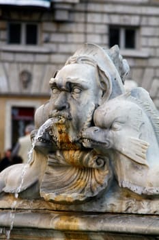 Close view details of the fountain of the four Rivers with Egyptian obelisk, located in the Piazza Navona, Rome, Italy.