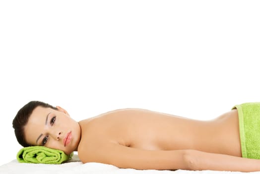 Beauty young woman relaxing in spa.