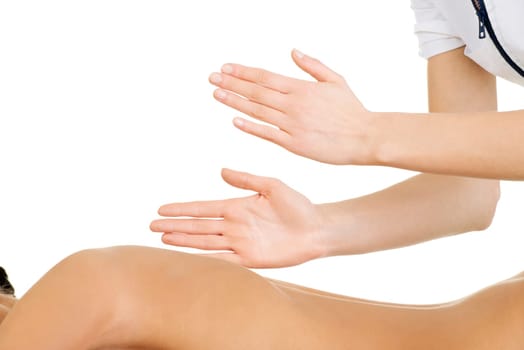 Preaty young woman relaxing beeing massaged in spa saloon