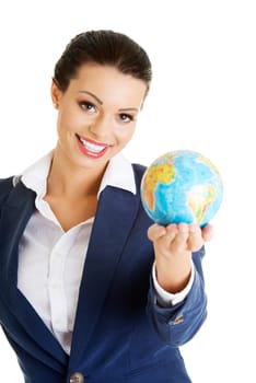 Young smiling businesswomen with globe