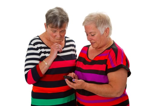 Two senior citizens with mobile phones - cropped on a white background