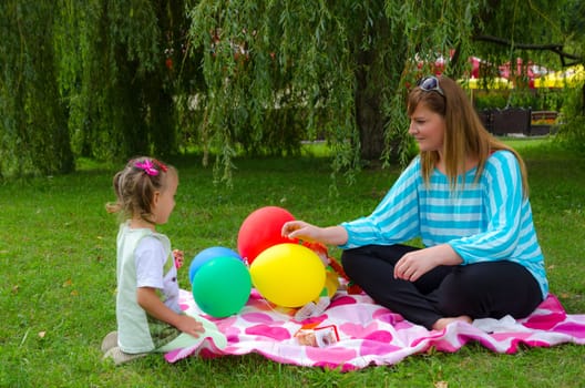 small girls with aerial balloon