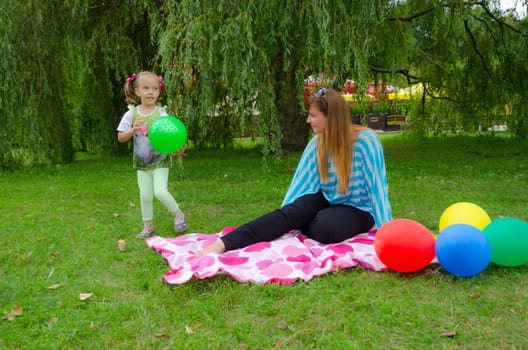 small girls with aerial balloon