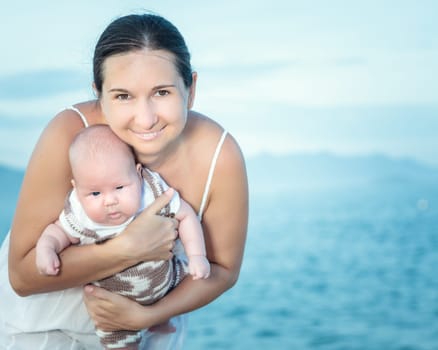 Baby and mom on the beach