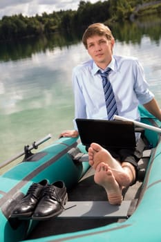 Dressed man in boat rest at sunny weather