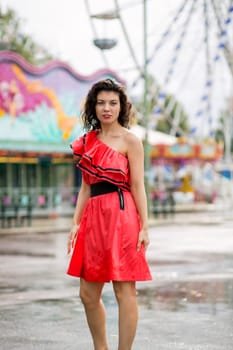 Woman in nice soaking wet dress at fair