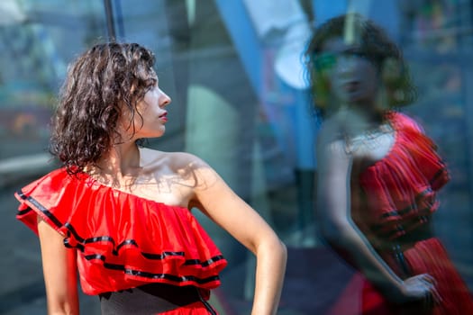 Woman in soaking wet dress marvel before reflection