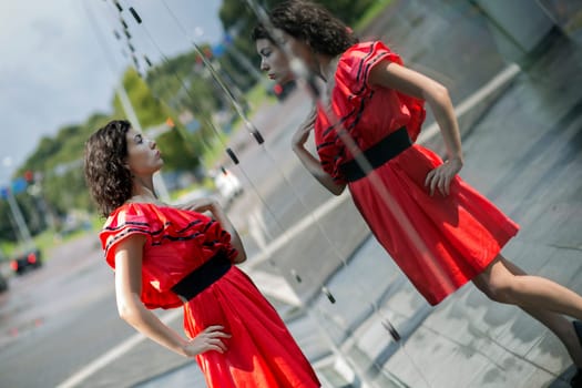 Woman in soaking wet dress adjust her outlook