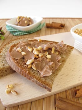 Chocolate cream with cinnamon and almond pieces