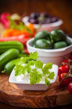 Antipasto and catering platter with wit raw vegetables and yogurt dip