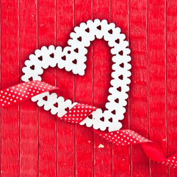 Red background with heart and ribbon