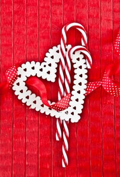 Red background with heart and candy canes
