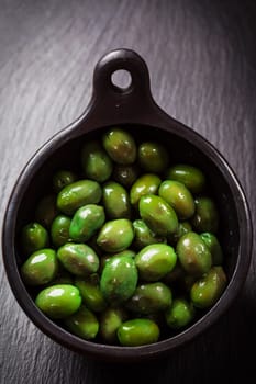 Green olives in the bowl