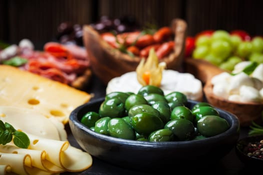 Antipasto and catering platter with different meat and cheese products