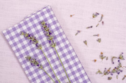 Purple checkered cloth with flowers of lavender
