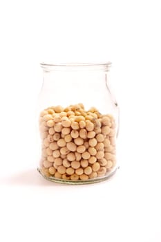 Lots of soybean in a glass pot.
