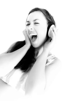 Young woman with headphones. girl listening to music in headphones