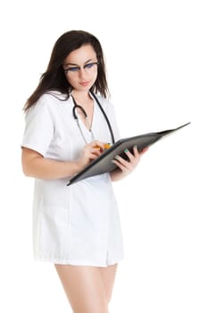 Smiling medical doctor woman Isolated over white background. Sexy beautiful smiling female brunette doctor