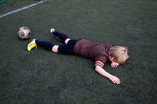 Boy after the football match