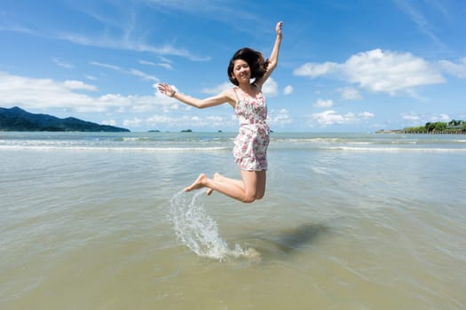 Teenagers on the beach,joy on holiday by the sea with blue skies